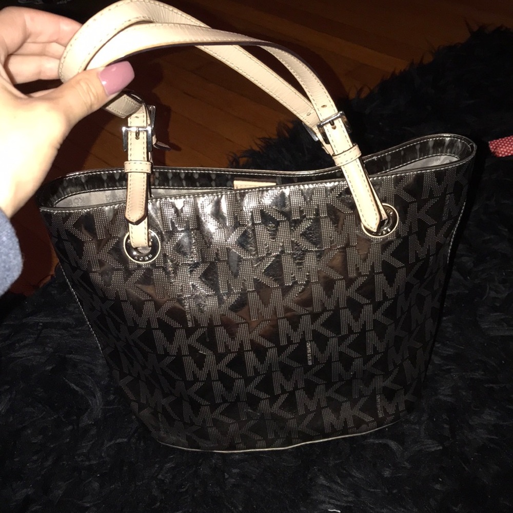 Michael Kors Purse w/ matching wallet.